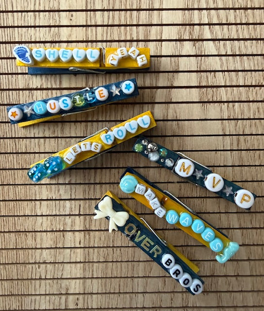 Cheer - yellow and blue Shell Yeah, Hustle, Lets Roll, MVP, Make Waves, Bows over Bros