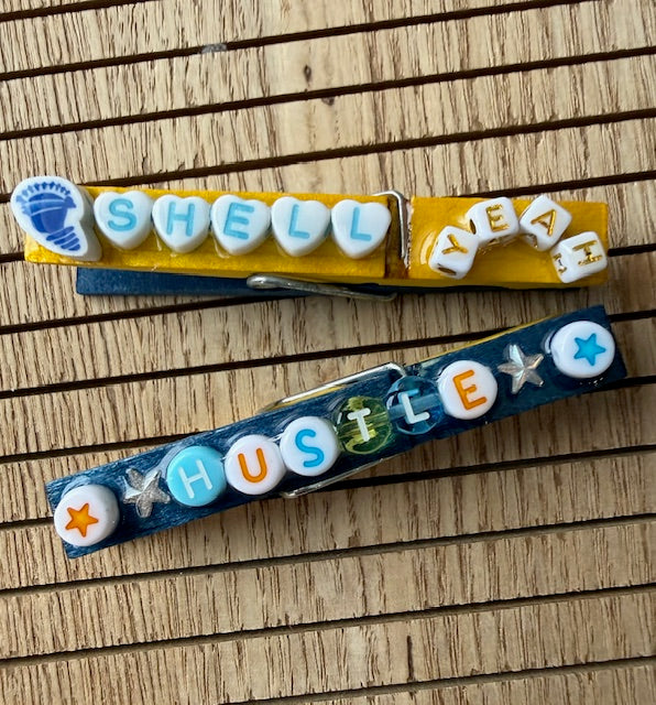 Cheer - yellow and blue Shell Yeah, Hustle, Lets Roll, MVP, Make Waves, Bows over Bros