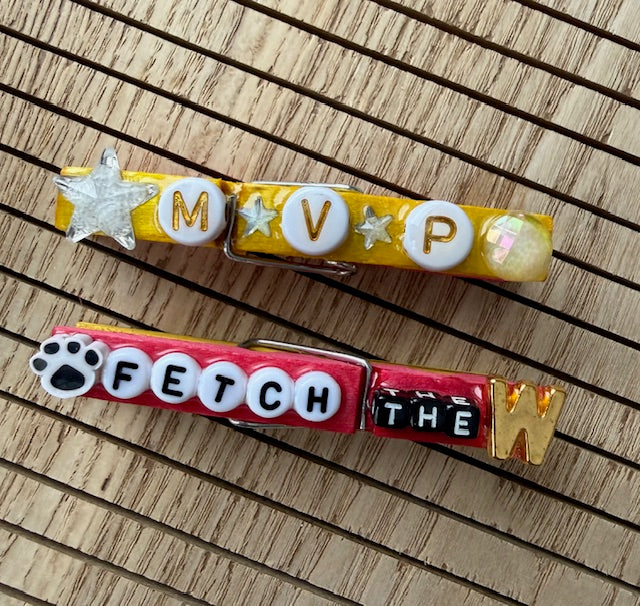 Volleyball - yellow and pink Cherry Bomb, GOAT, Fetch the W, MVP, Okay Queen, and Hoppsss