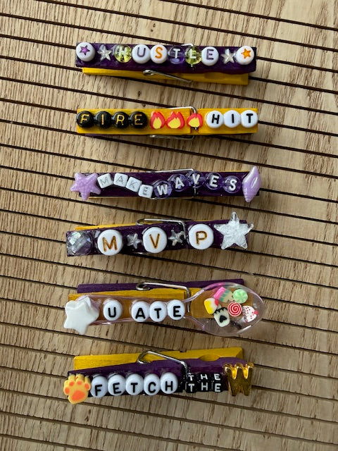 Volleyball - yellow and purple Fetch the W, Hustle, Fire Hit, Make Waves, MVP, and U ate