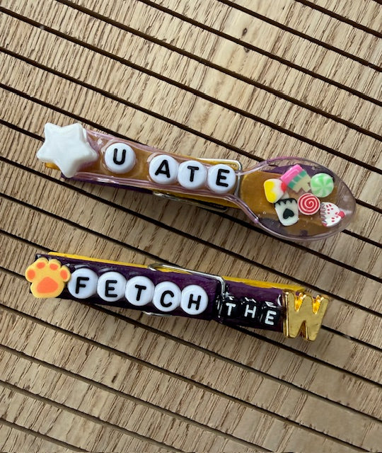 Volleyball - yellow and purple Fetch the W, Hustle, Fire Hit, Make Waves, MVP, and U ate